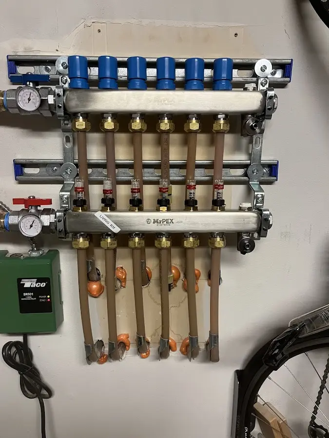 Plumber performing Gas Leak Detection at a residential property in Manorhaven