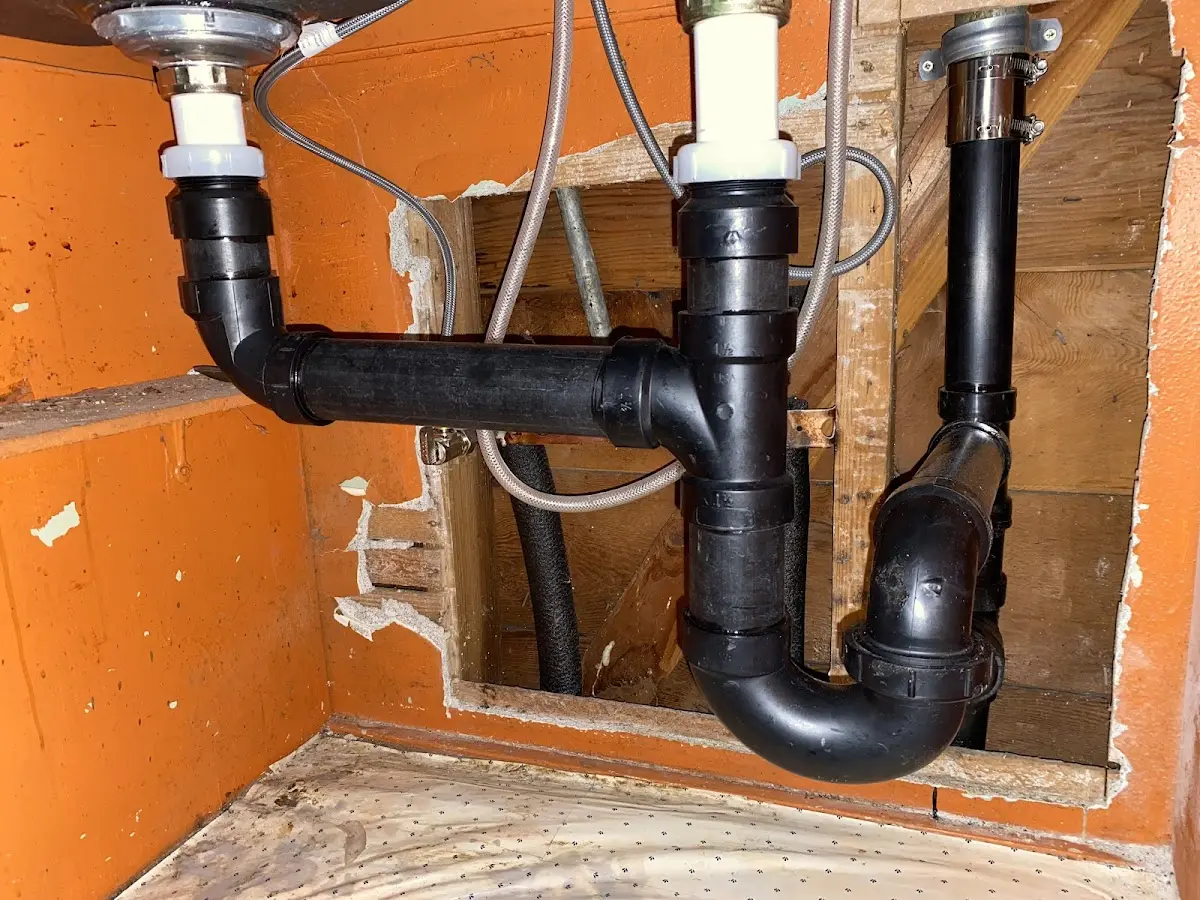 Professional Garbage Disposal Repair equipment and tools on the job in Manorhaven